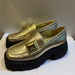 Katy Perry combat GoldLoafers with Chunky Black Sole